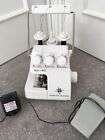 Electric overlocker sewing machine. Light, portable, compact & hardly used. 