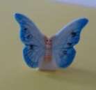 Fève thème Animaux Papillon bleu ciel de Colombie réf 1241