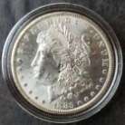 1883 CC $1 Morgan Silver Dollar in a Capsule