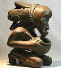 Ancienne statuette en bois africanisme